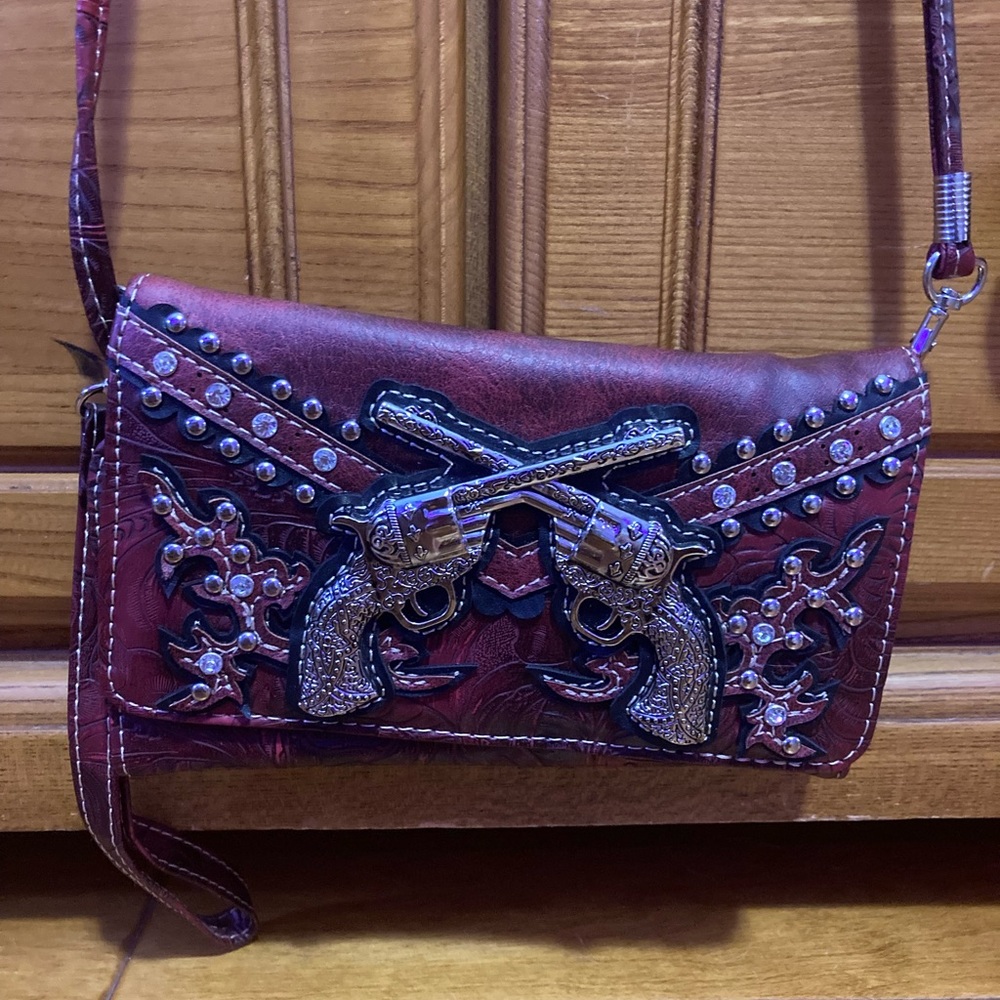 Maroon with gun design small purse wallet and wristlet